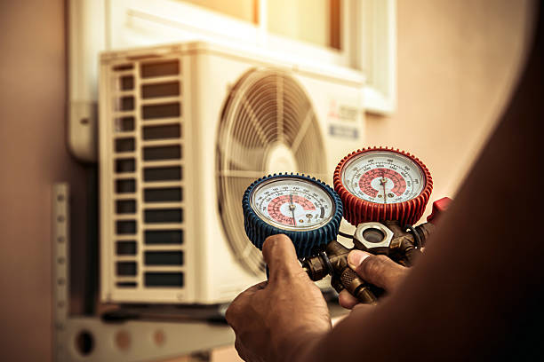 Professional Hvac technician working in Urbana, MD